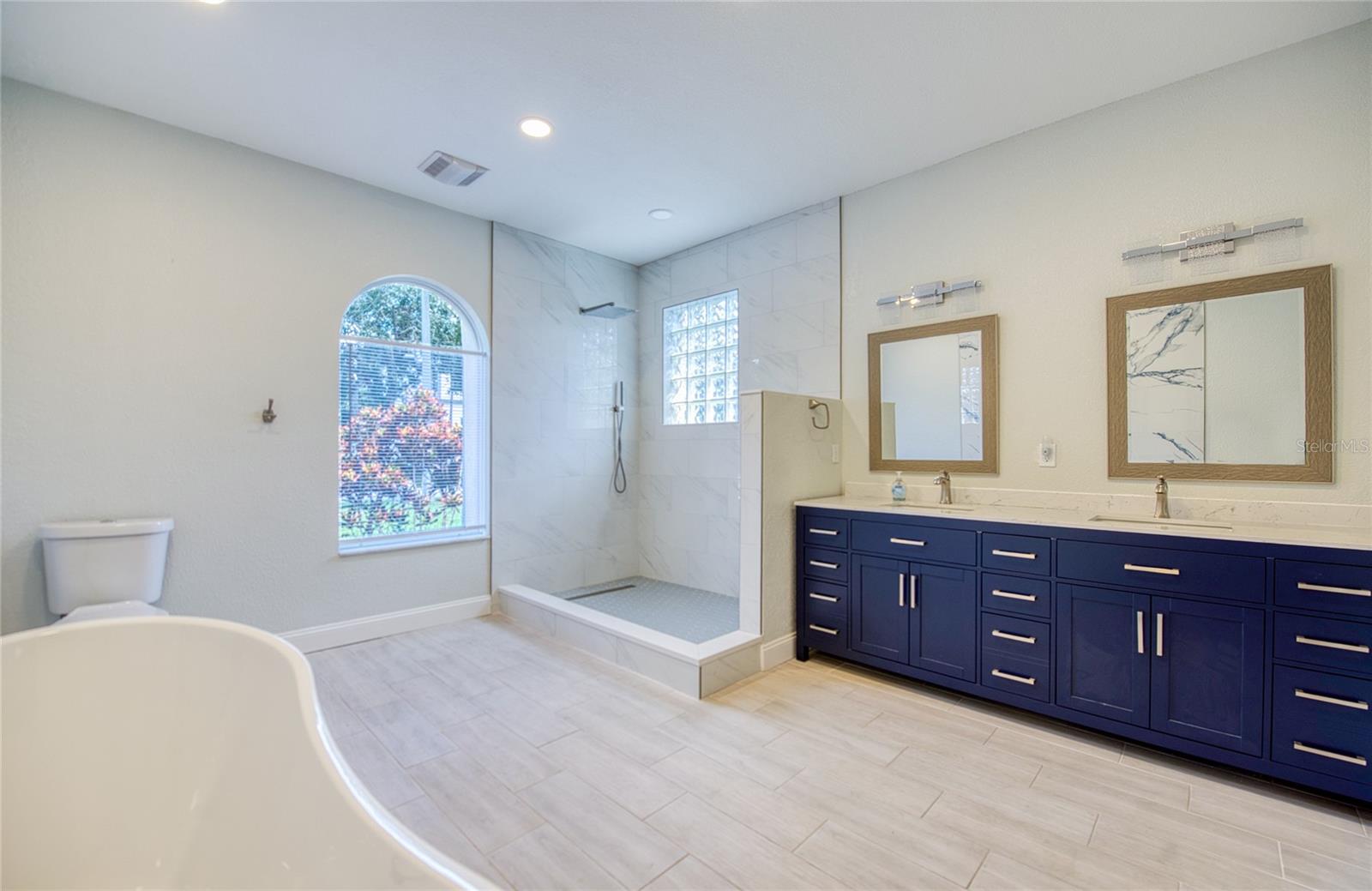 Light, bright gorgeous main bath