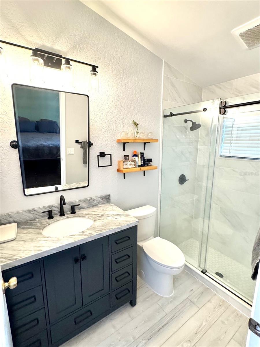 En suite updated primary bathroom