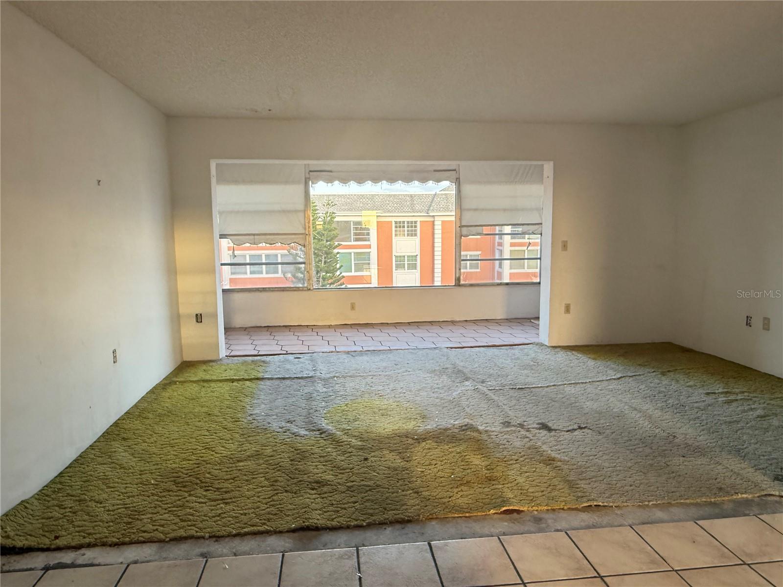 New flooring, paint and lighting would easily transform this entire space, making it feel spacious, airy with lots of natural light.
