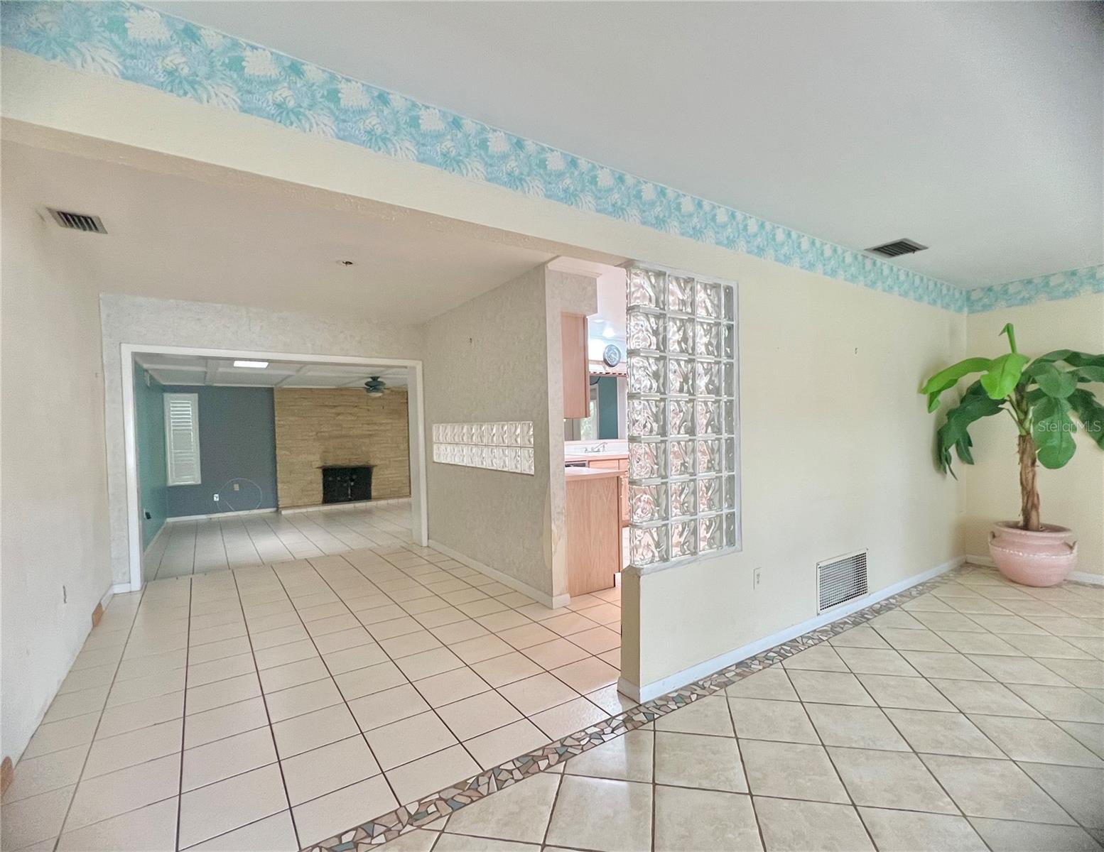 From living room to dining and into Family room