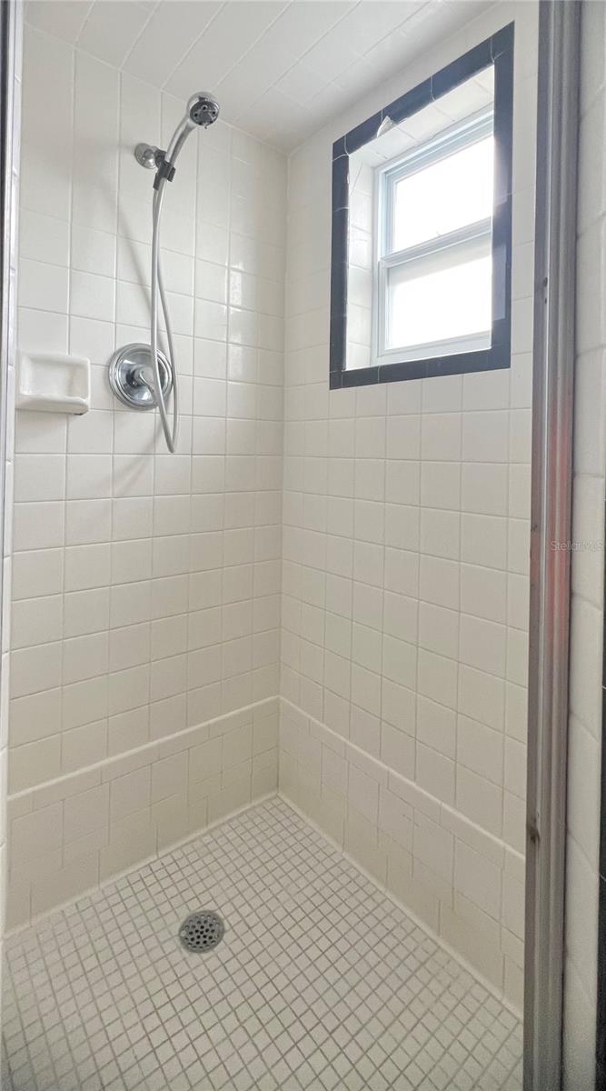 BathroomWith walk in shower
