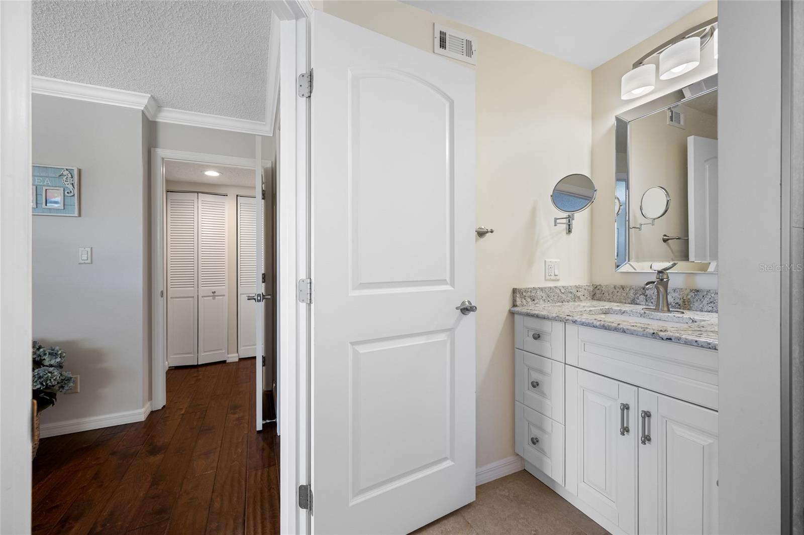 En Suite custom vanity with granite vanity top