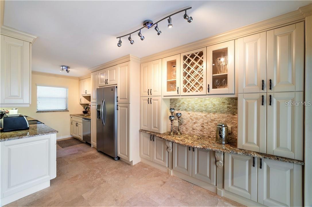 Kitchen with elegant detail shown in all areas.