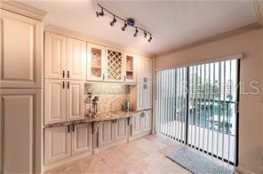 Kitchen with extended custom cabinetry, allowing plenty of storage space.