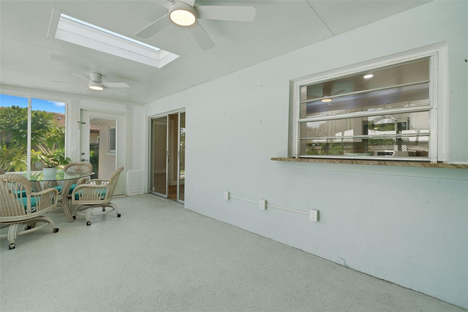 Sun room with kitchen pass through