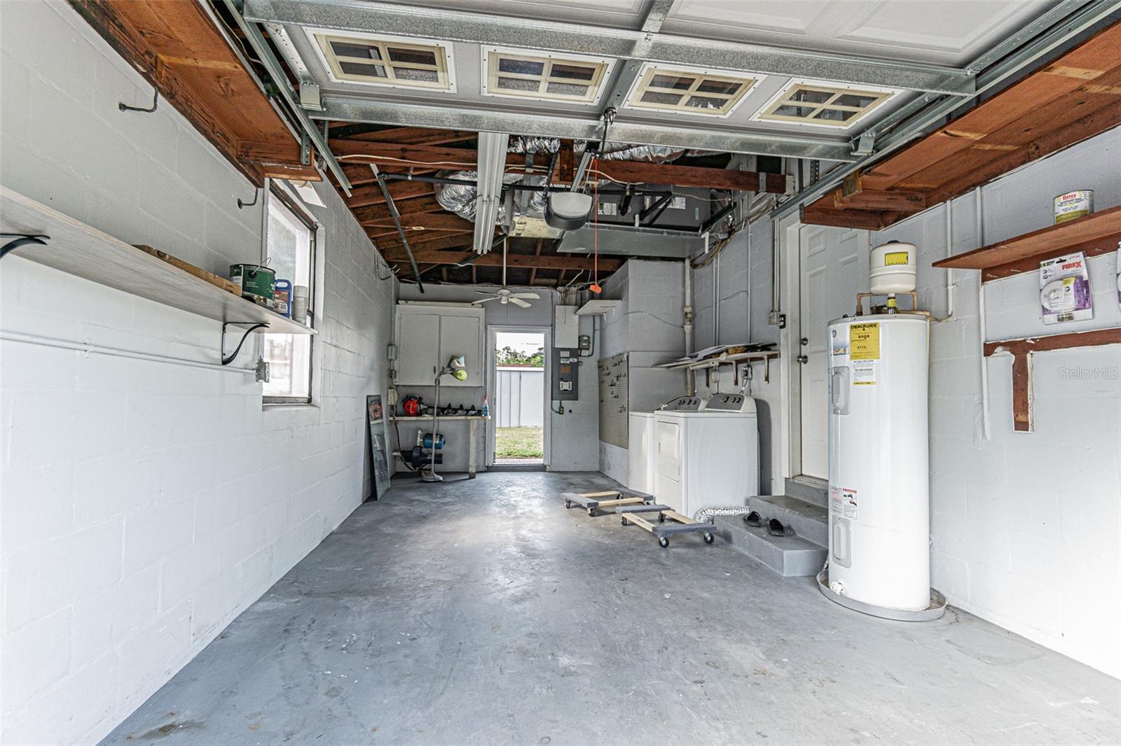 One car garage with washer dryer
