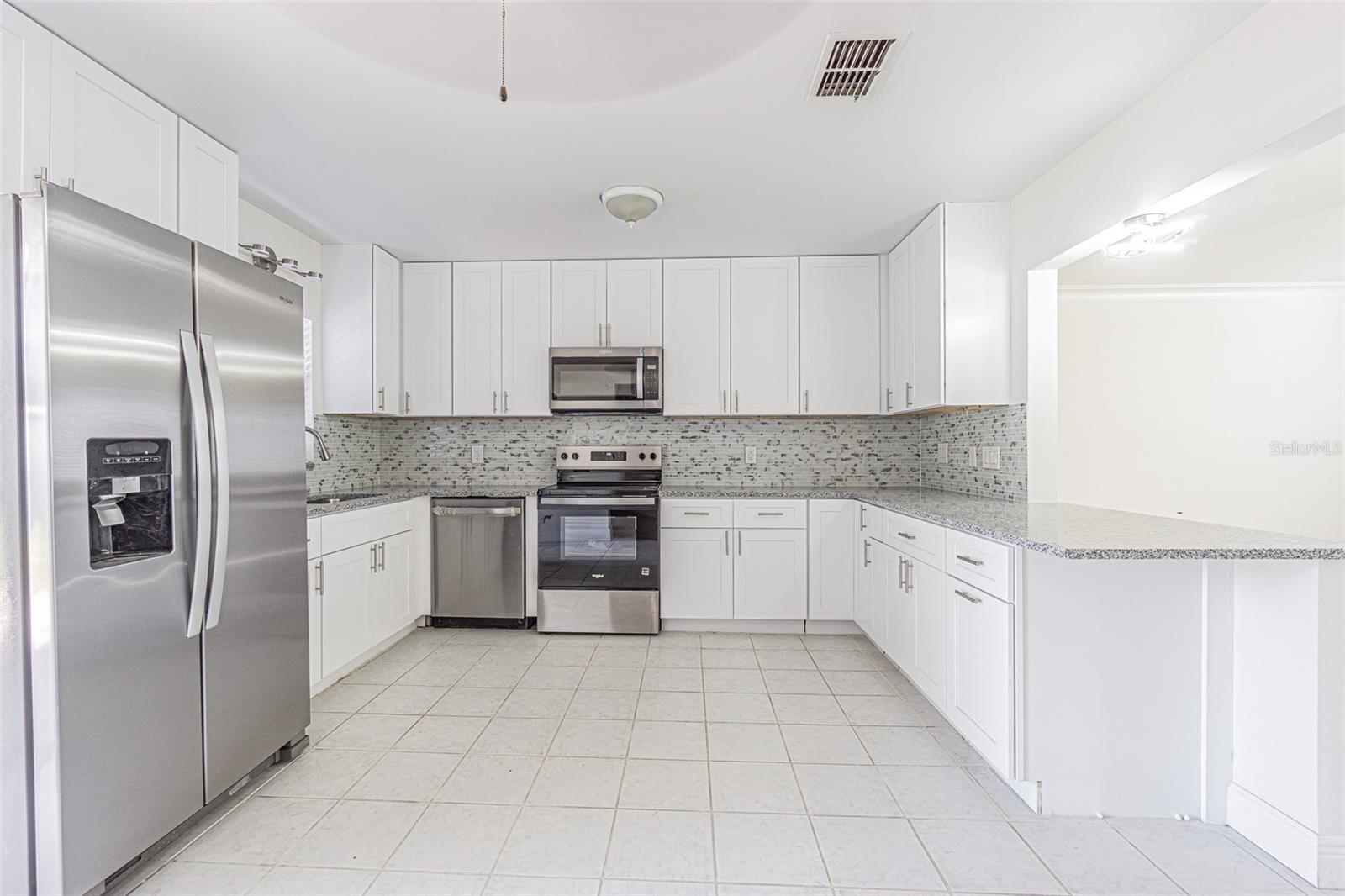 Kitchen with granite countertops