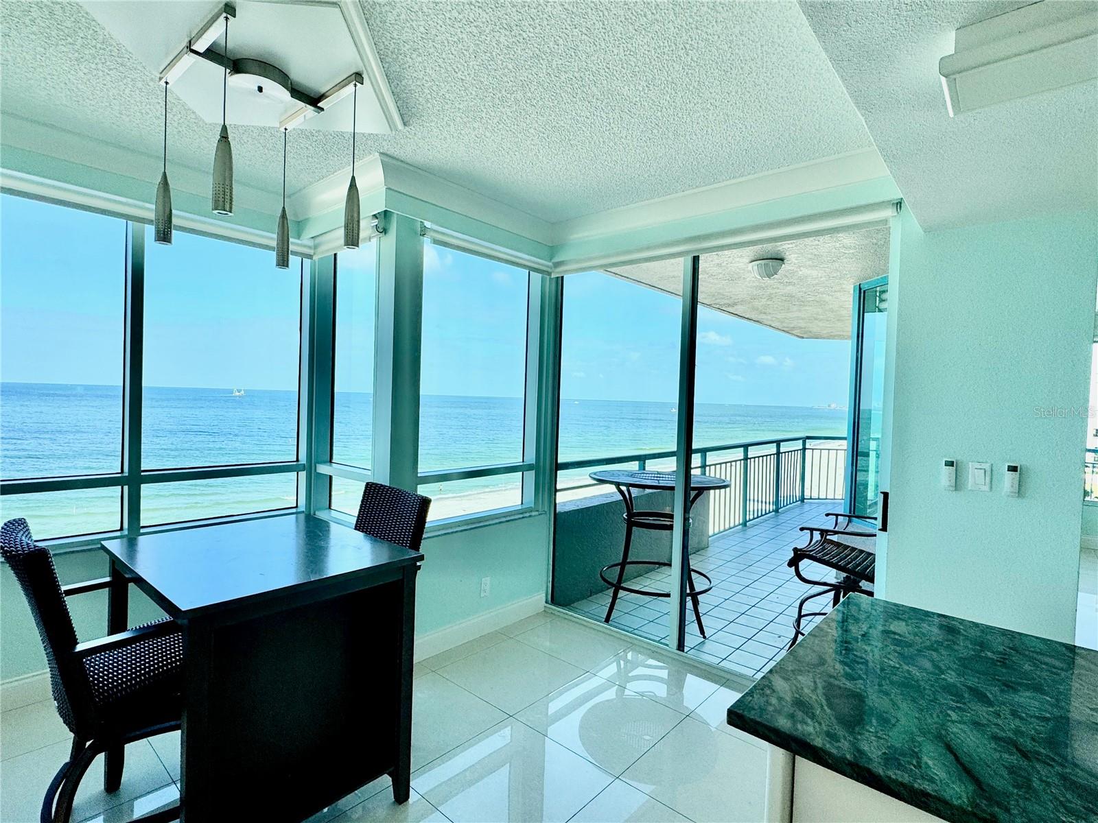 Near the kitchen the breakfast nook offers world class views and luxury!