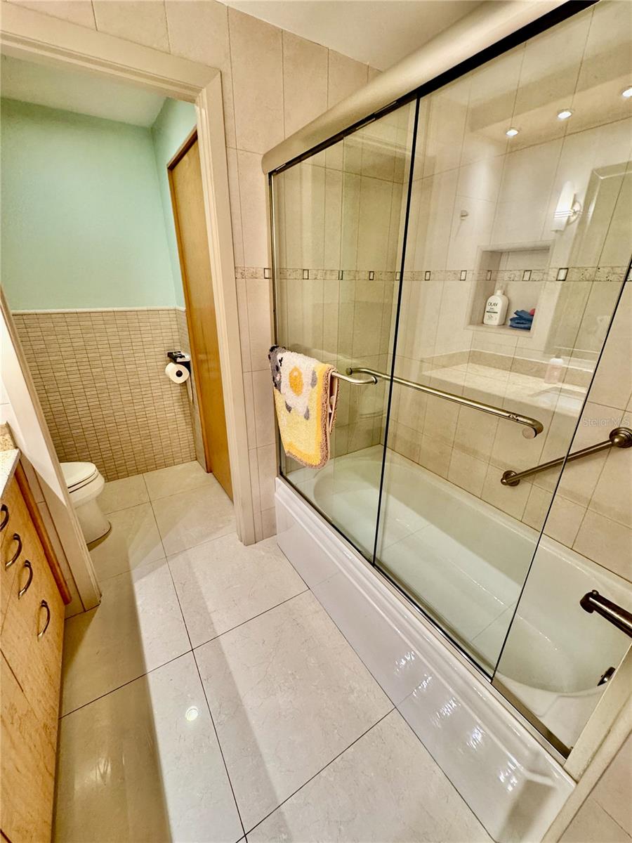 2nd Bathroom Tub and Shower with custom telework.