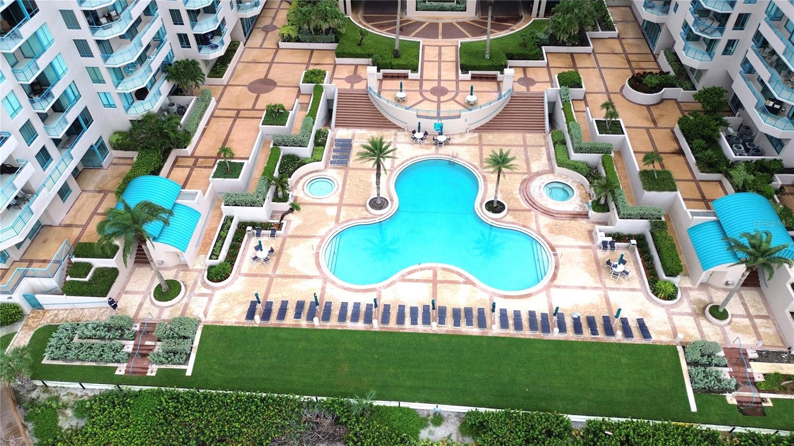 Largest pool the "Mickey" pool, hot tub, seating and loungers