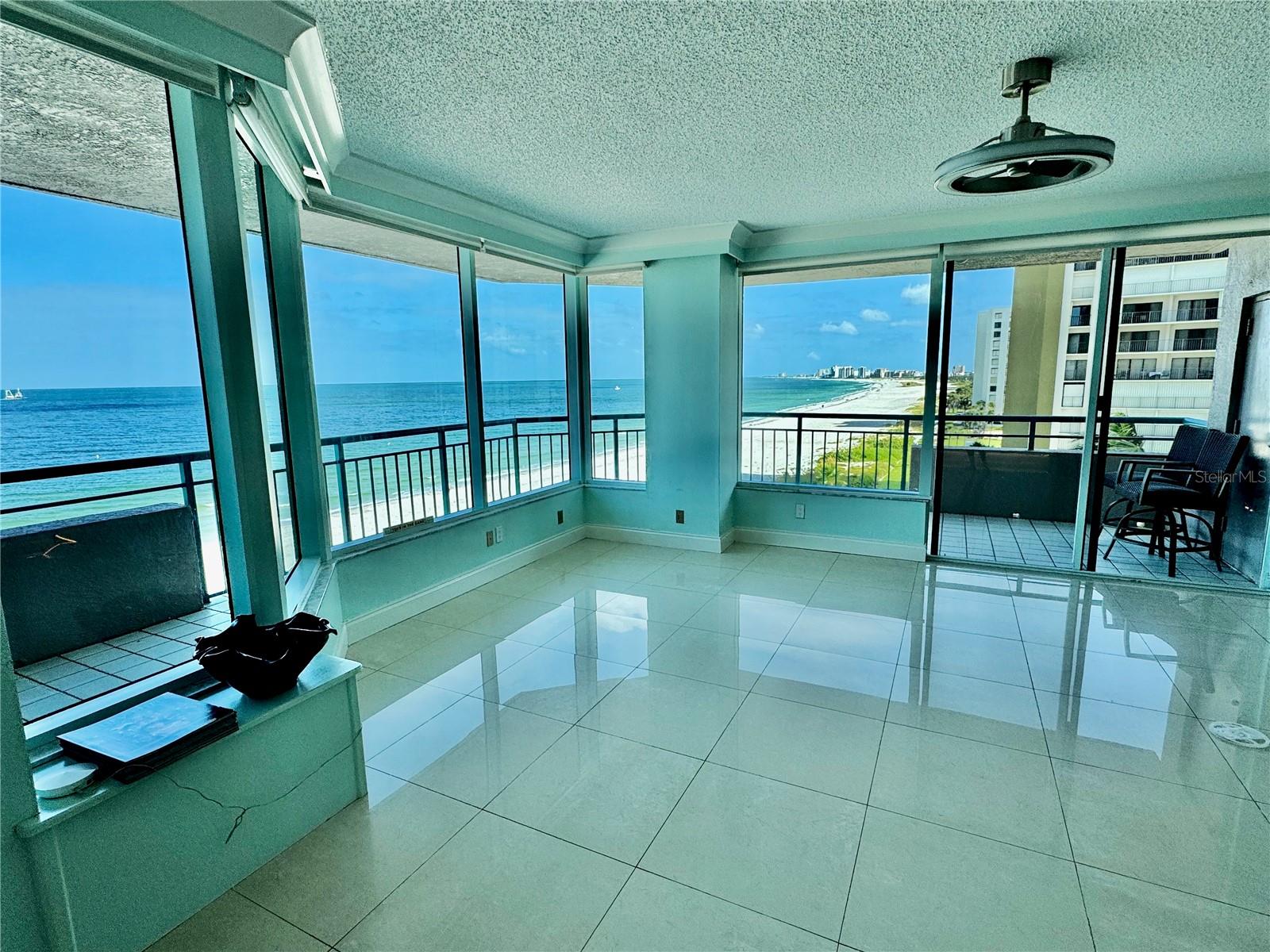 The family room is a huge wonderland of windows, views and space
