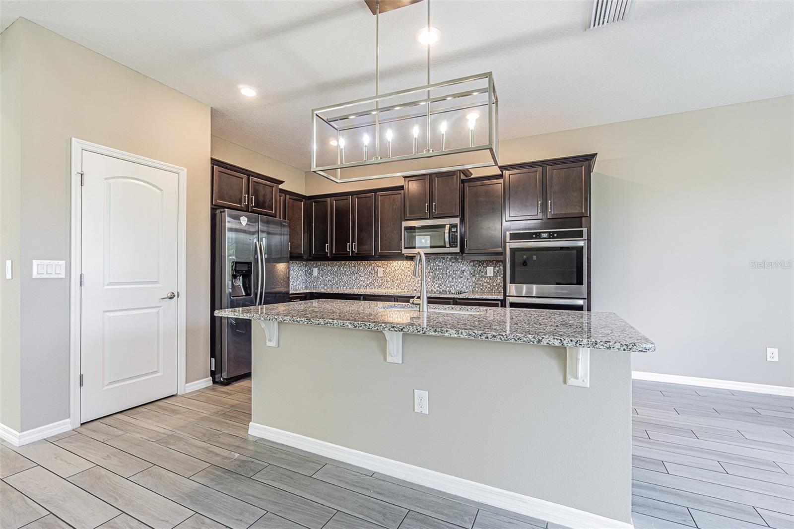 Kitchen with lots of cabinets for storage space