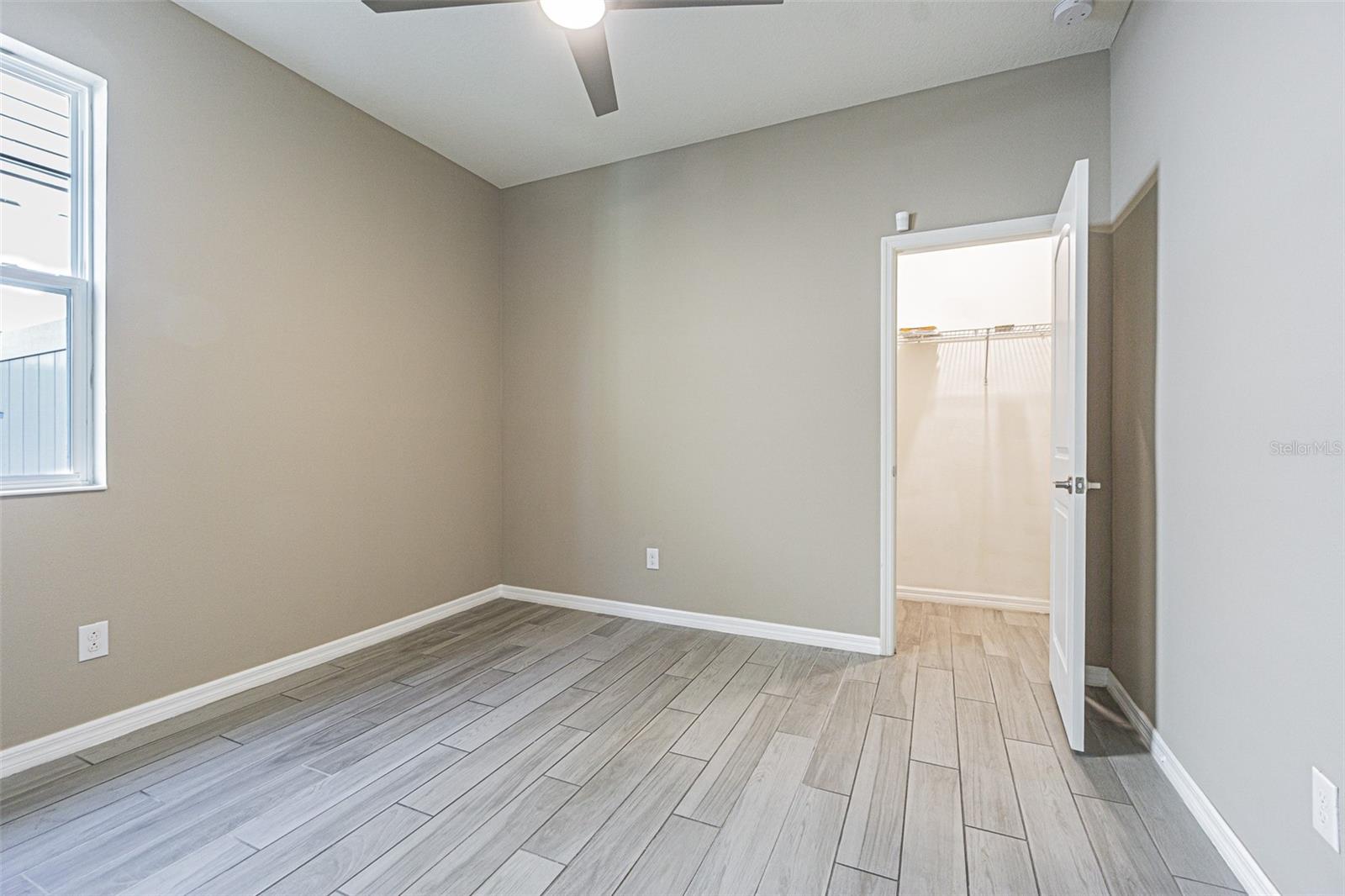 First floor bedroom with walk in closet