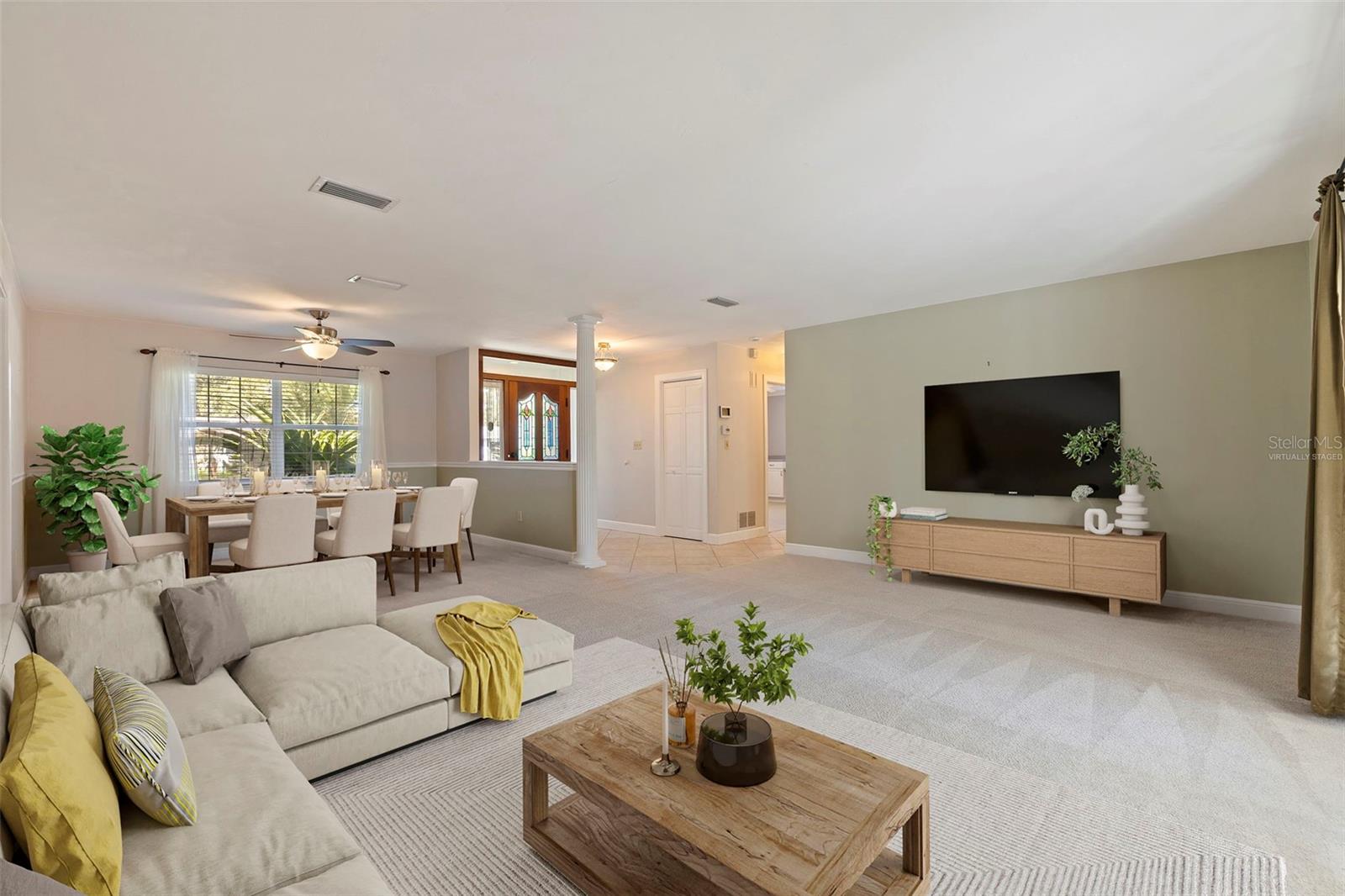 Large formal living and dining area *virtually staged*