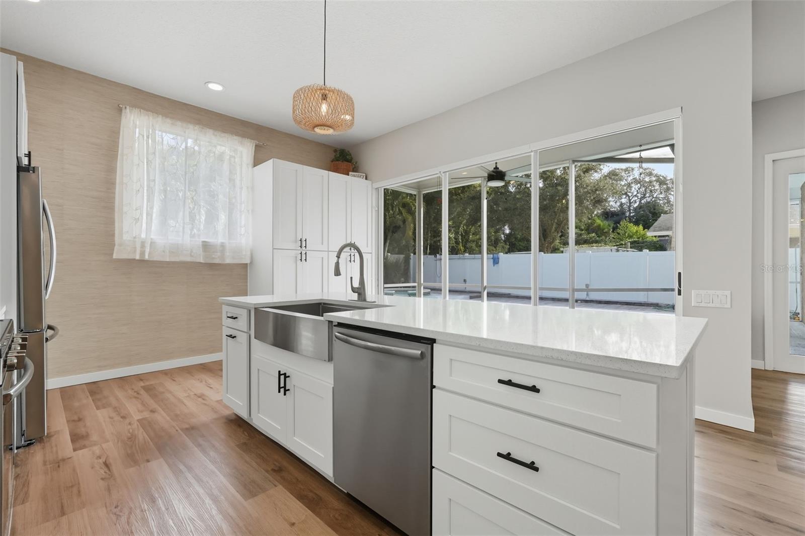 Moved Kitchen to overlook the pool.