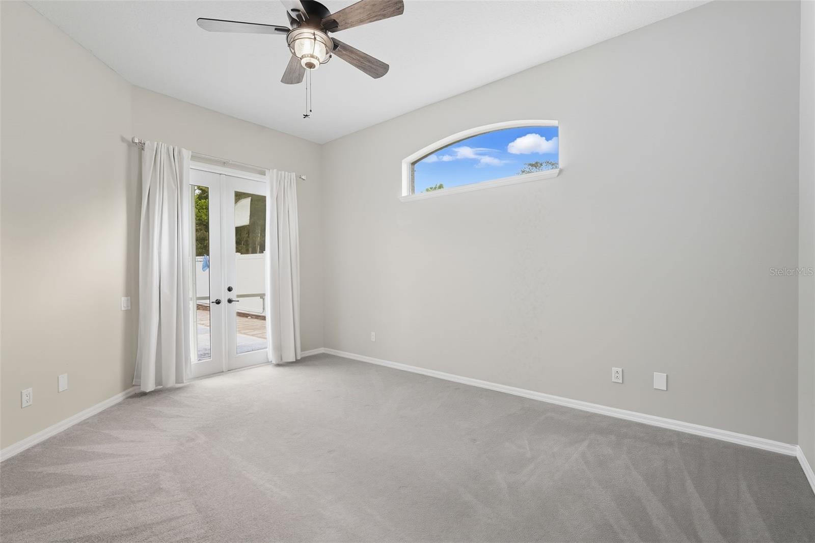 Primary with Doors Leading to Pool - New luxury padding & carpet