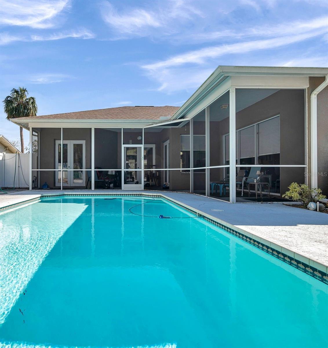 Sparkling Pool just off the Lanai.  Access from Primary, Living & Kitchen.