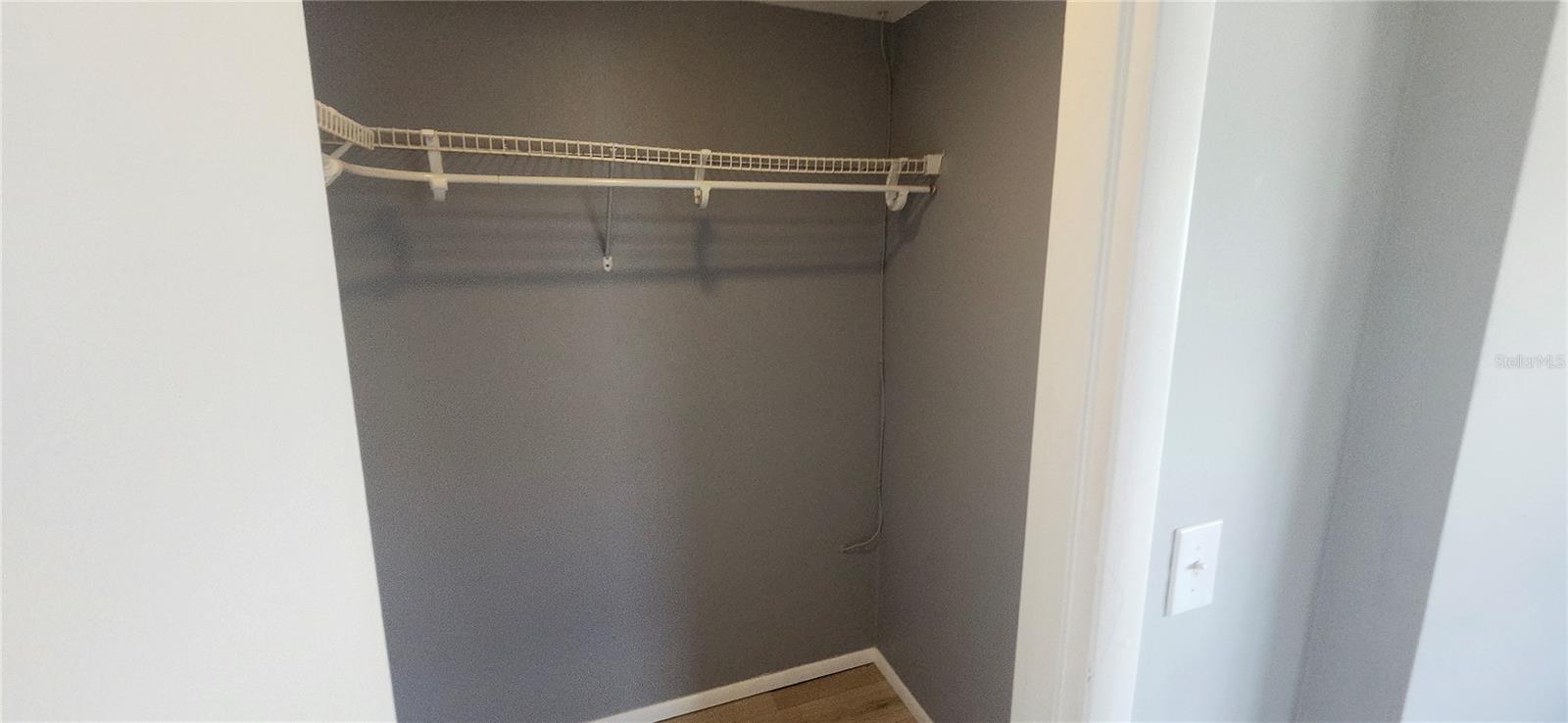 Primary Bedroom Walk in Closet.