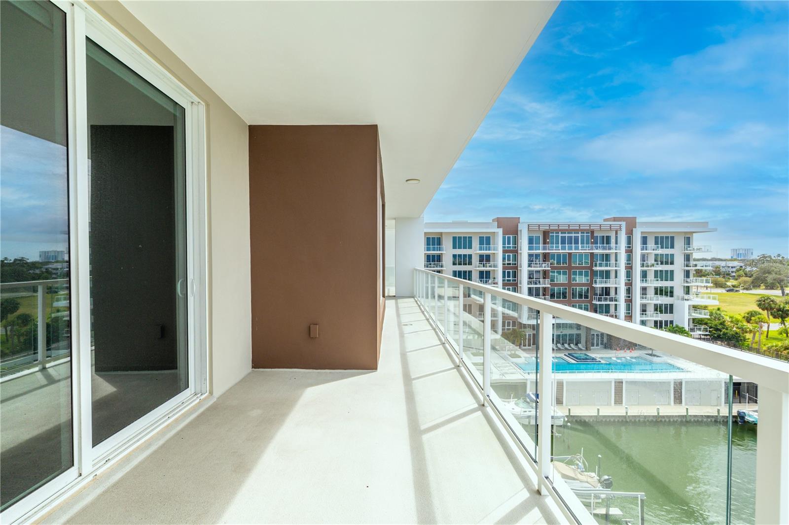 Look southeast and wake up to the gorgeous sunrise, pool and marina view