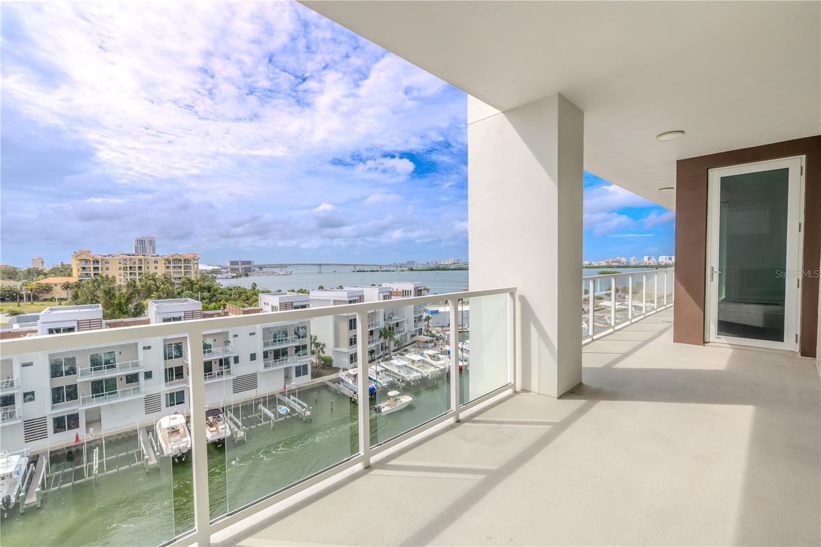Step onto your private balcony and take in breathtaking views of the Intracoastal Waterway, where shimmering waters meet the skyline of Clearwater. From this elevated vantage point, you’ll enjoy a sweeping panorama that includes both the iconic Memorial Causeway and Sand Key Bridge—each beautifully illuminated at night for a dazzling display.