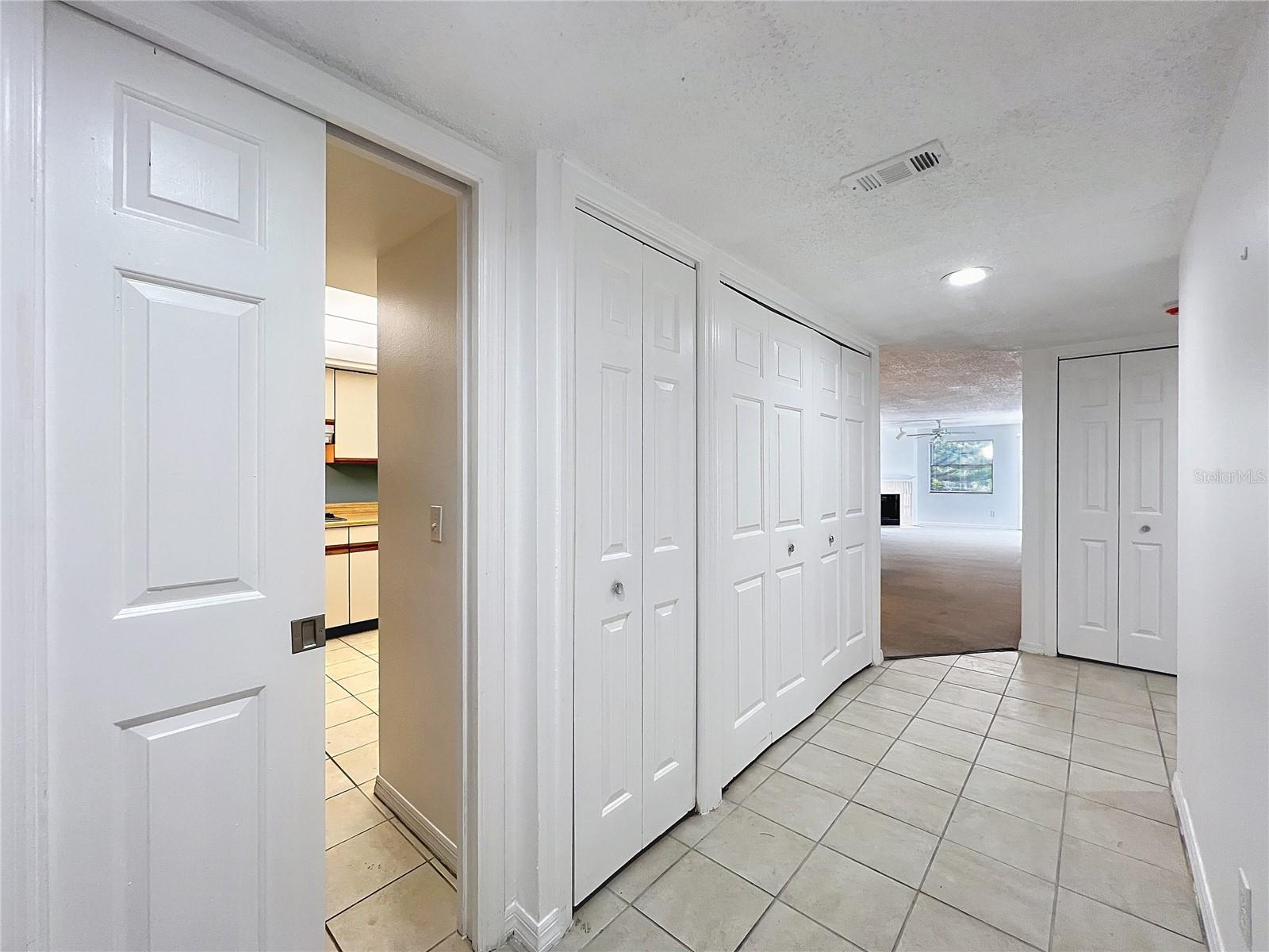 Pocket door into the kitchen.