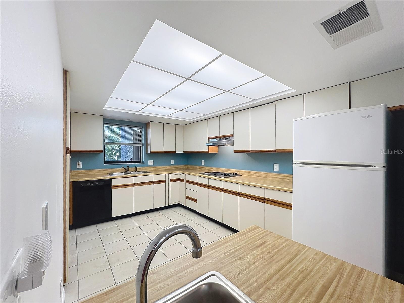 Actual kitchen - large with TWO sinks.