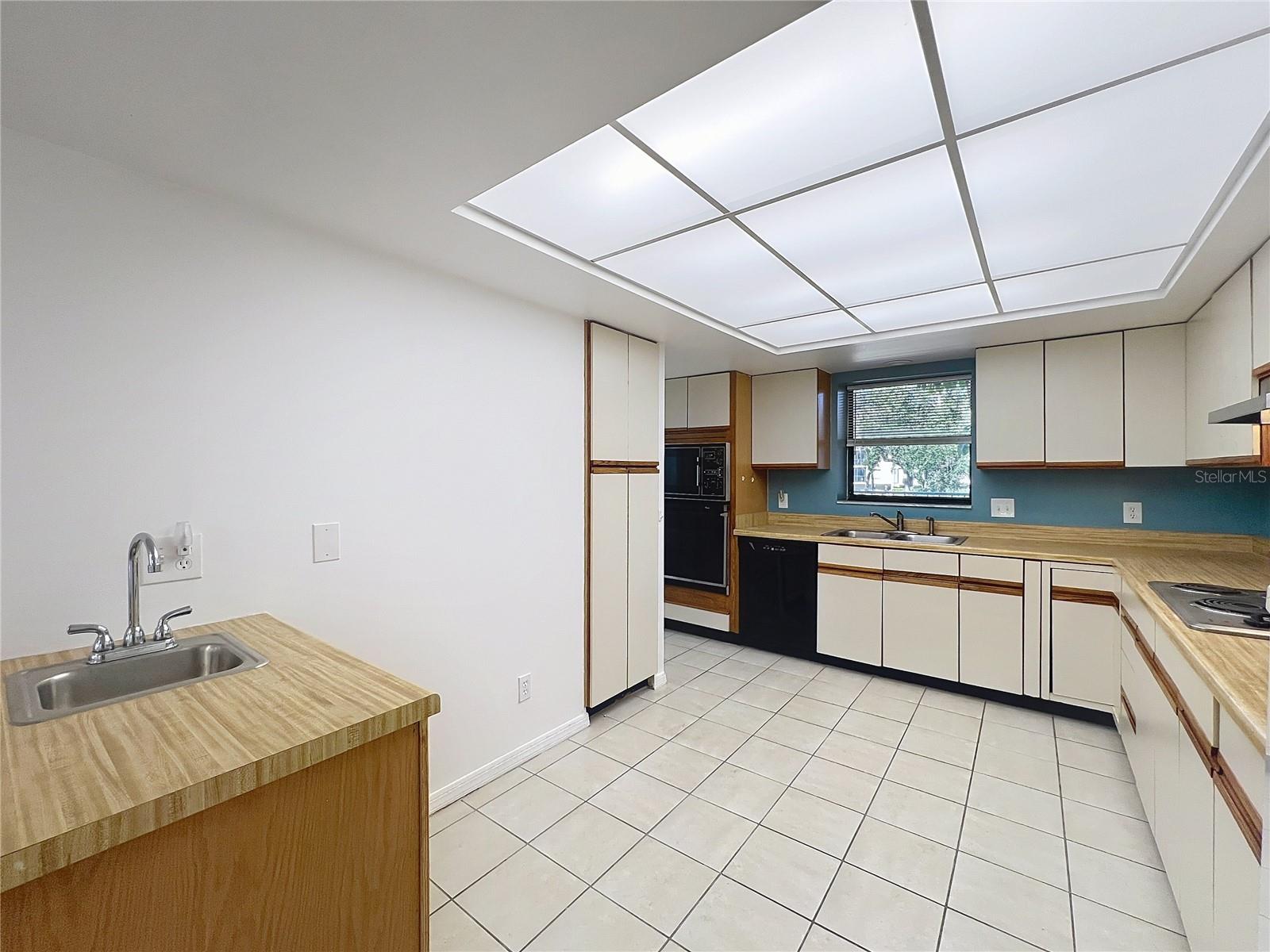 Actual kitchen - large with TWO sinks.
