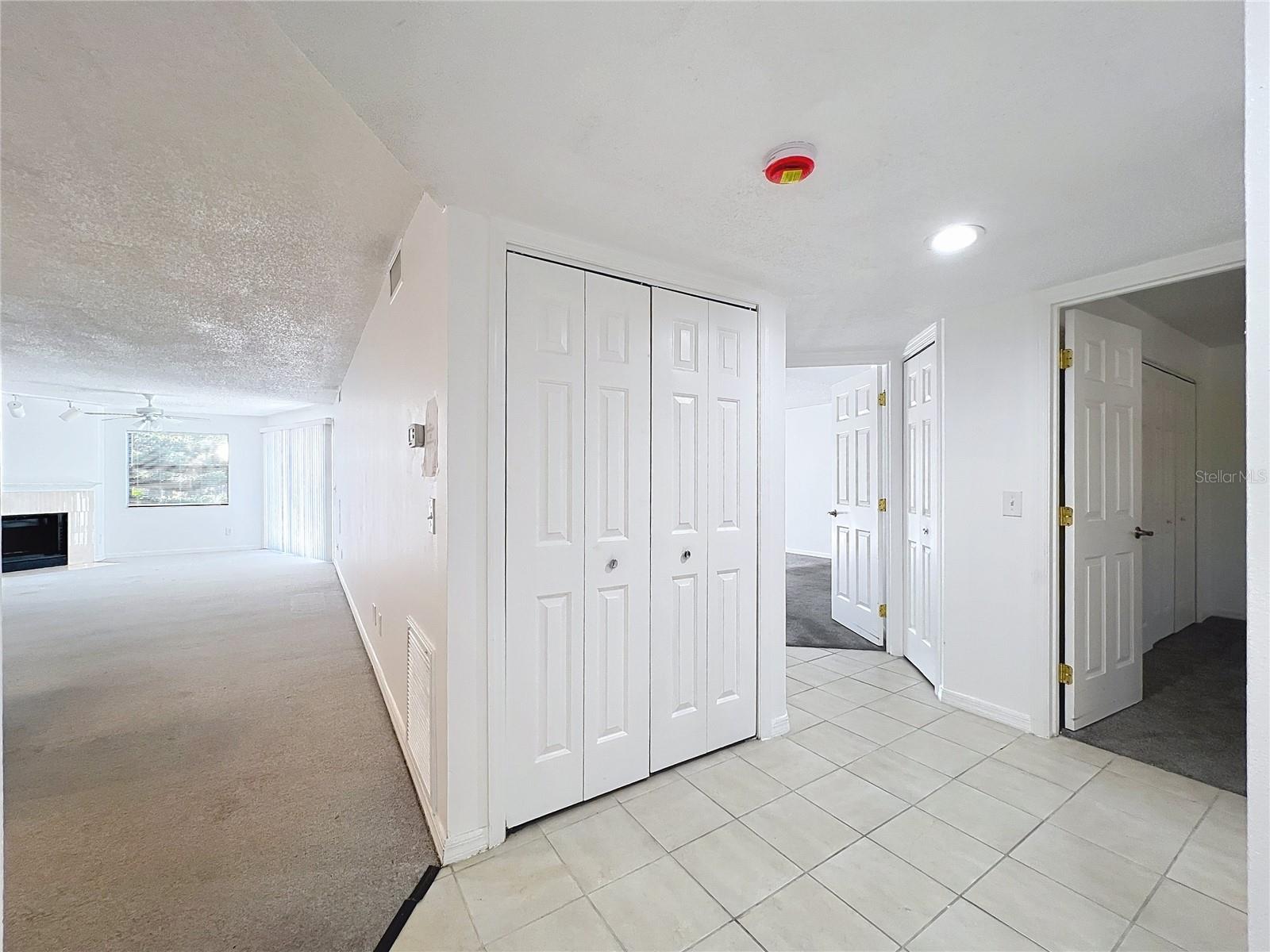 Hallway leading to great room and two bedrooms.
