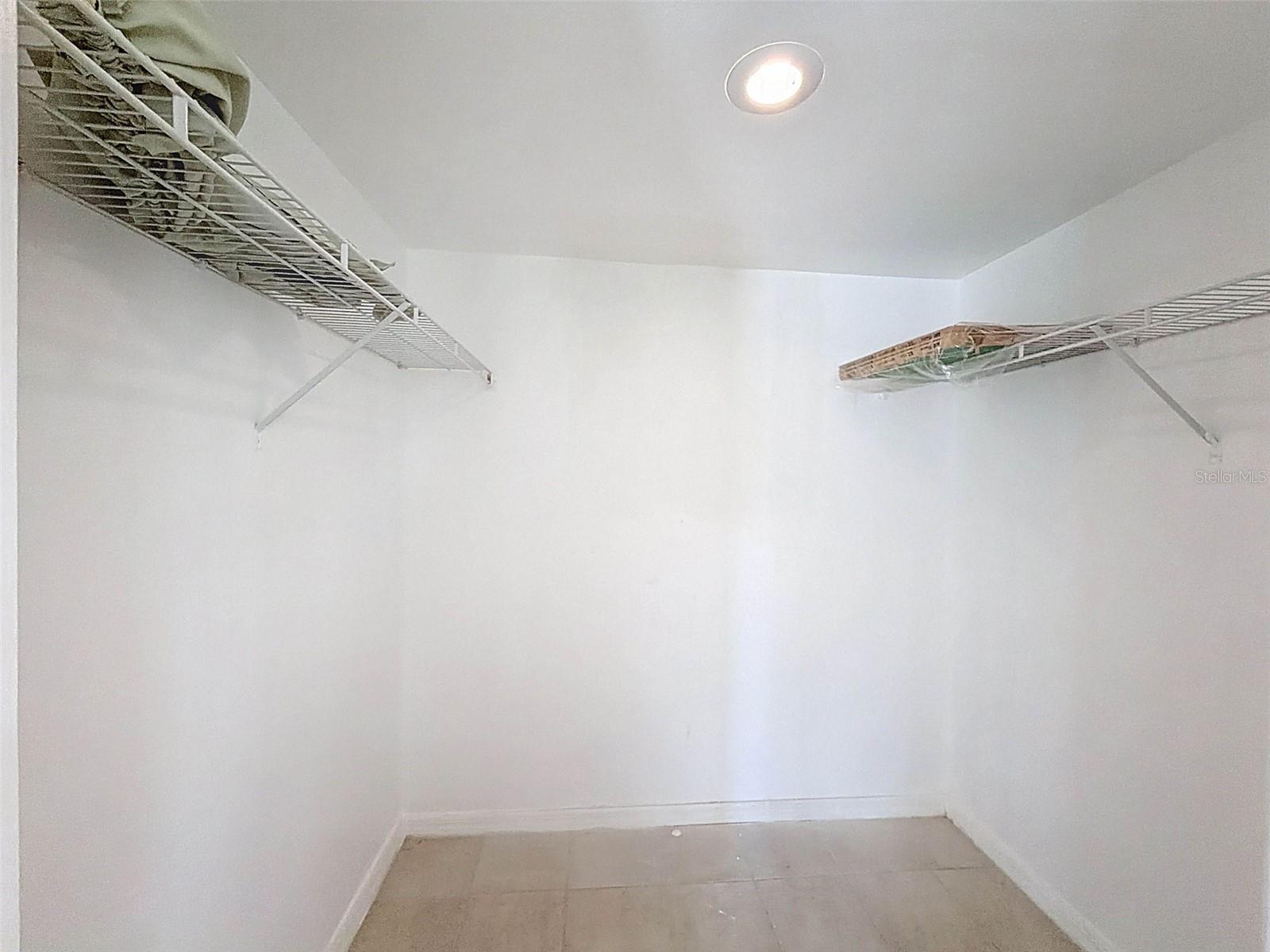 Walk-in closet in the master bathroom.