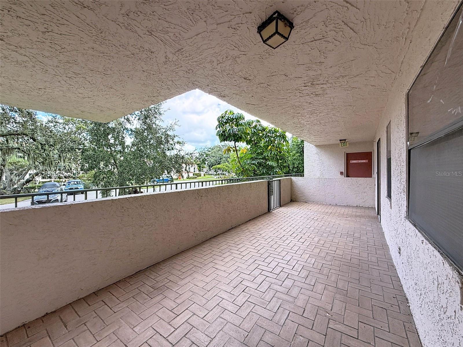 1 of 3 private, covered patios. This one is at the front.