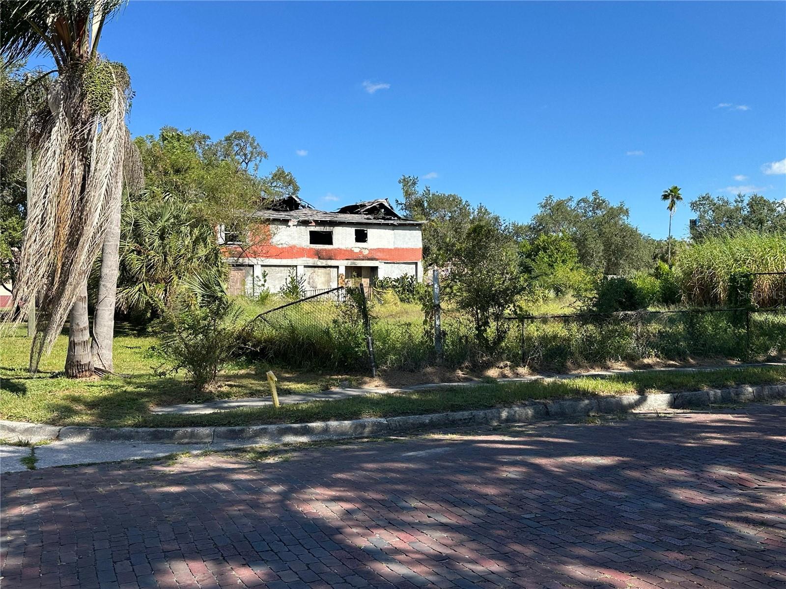 Tear Down with $4.1 Million Land Appraisal (combine other parcels)