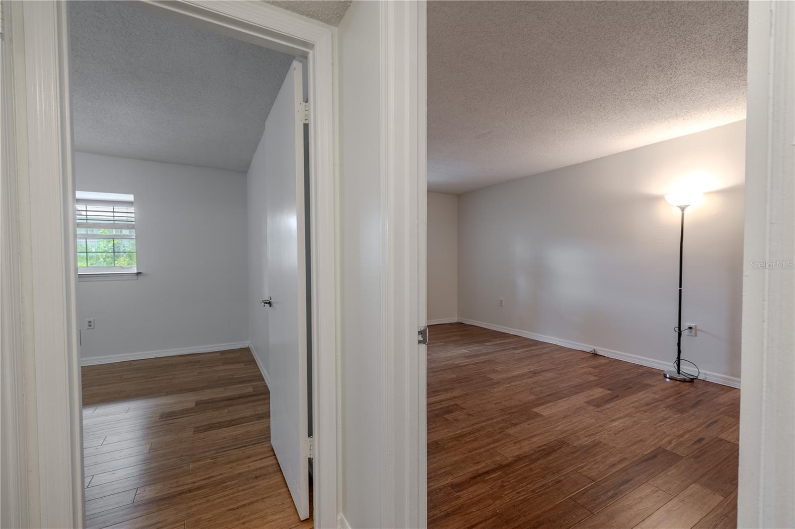 2nd bedroom (left), primary bedroom (right)