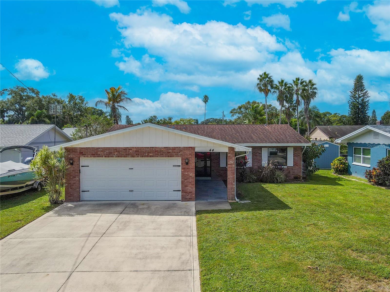 Welcome home to your Palm Harbor waterfront retreat with direct canal access to Lake Tarpon.