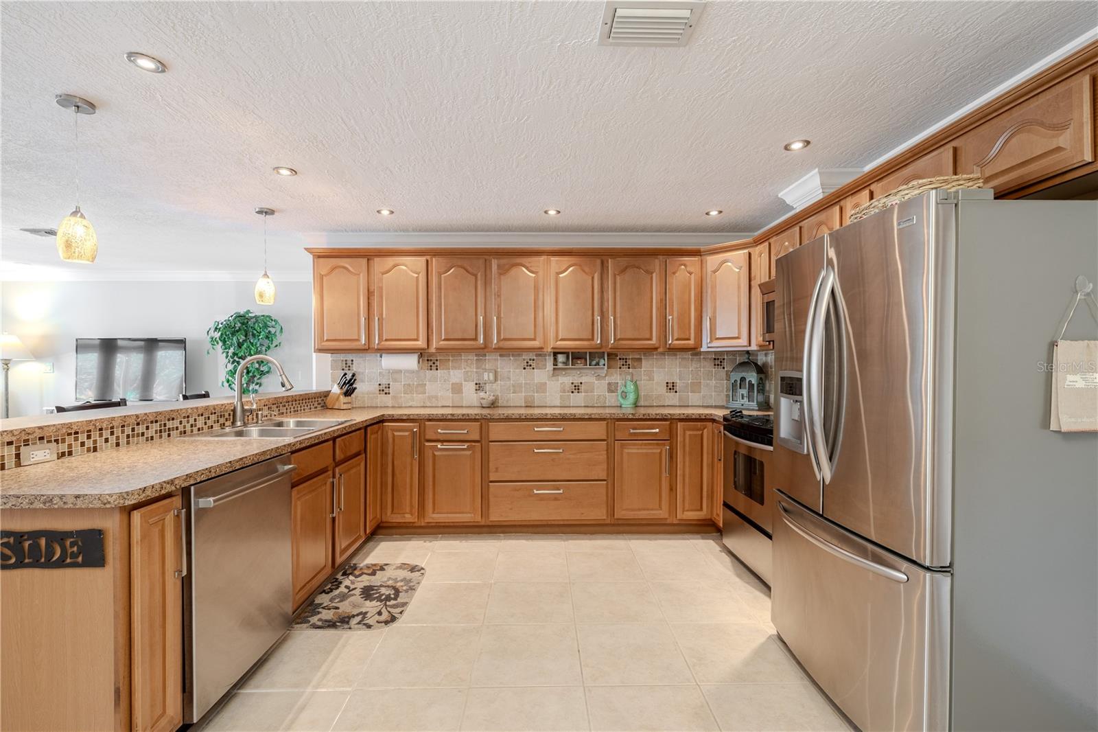 Generous cabinet and counter space with a functional layout that keeps everything within easy reach.