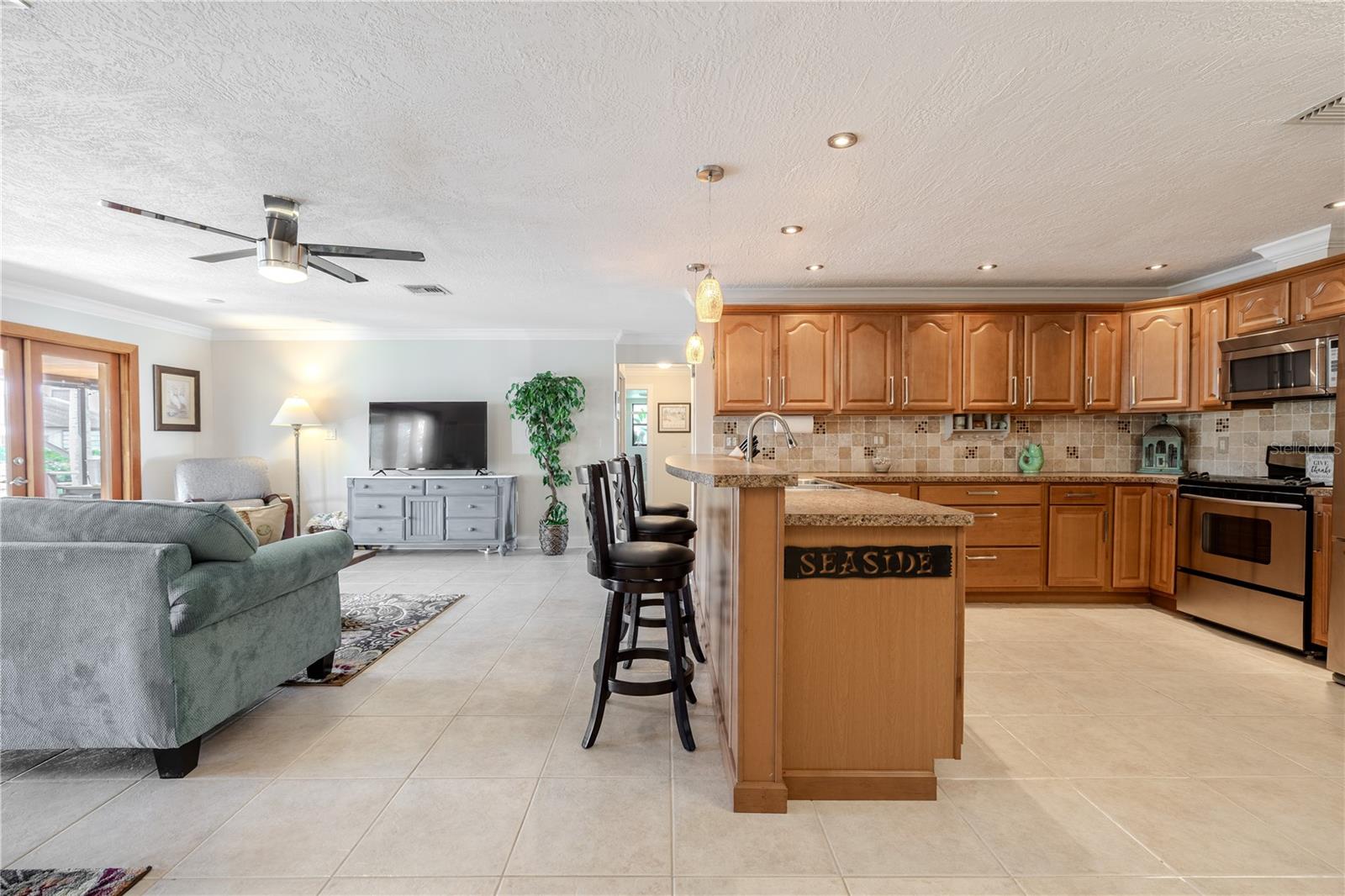 Breakfast bar and prep area offering a comfortable spot for casual meals or morning coffee.