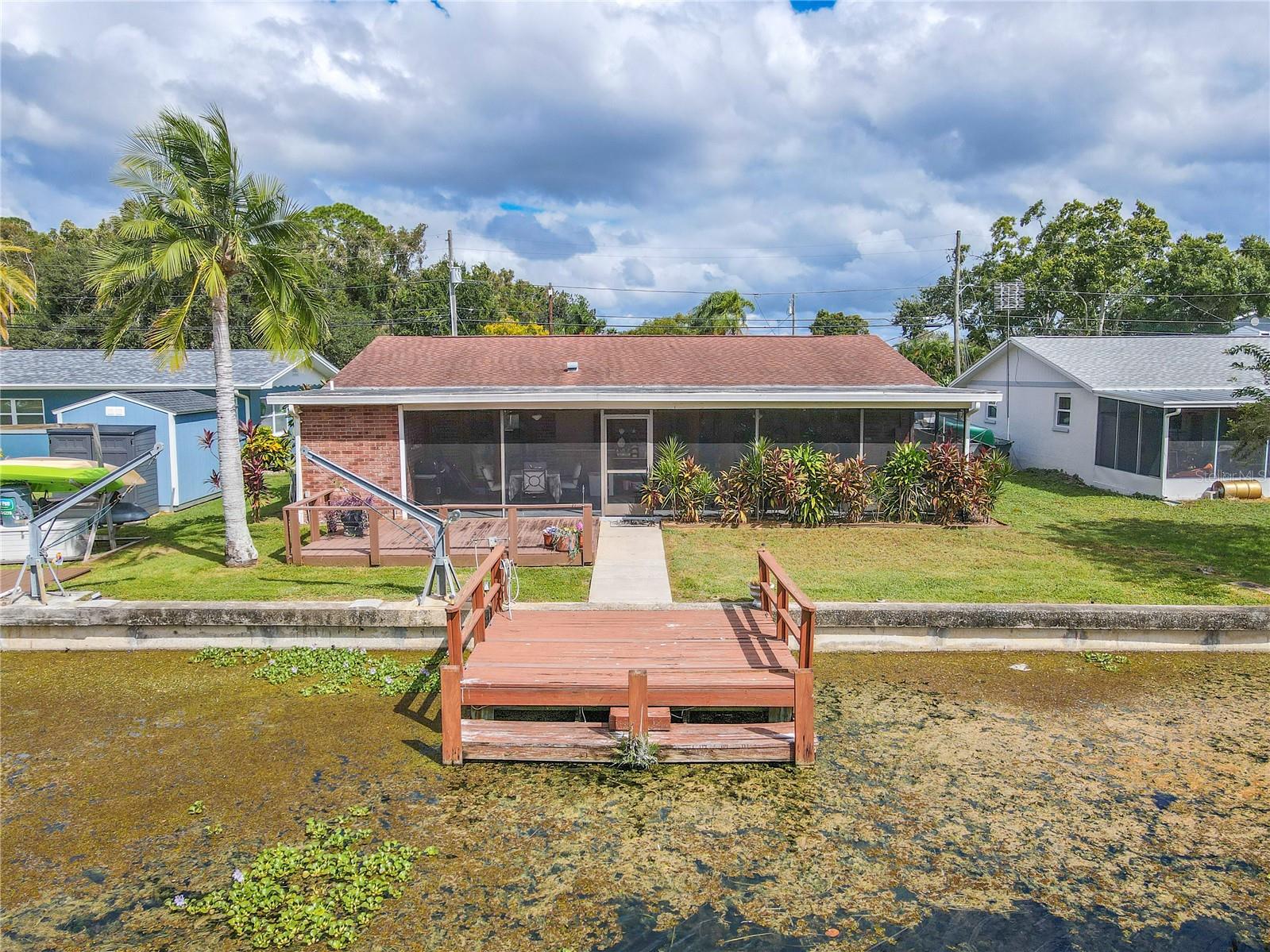 Private dock and open deck area ideal for fishing, relaxing, or launching small watercraft.