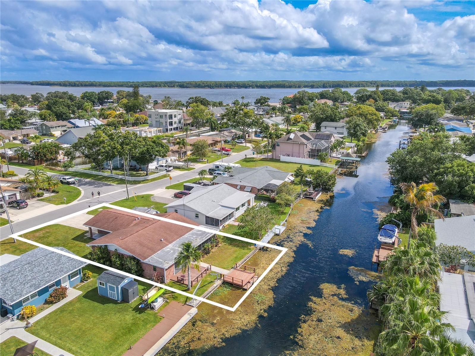 Aerial view showcasing the canal connection leading directly to Lake Tarpon.