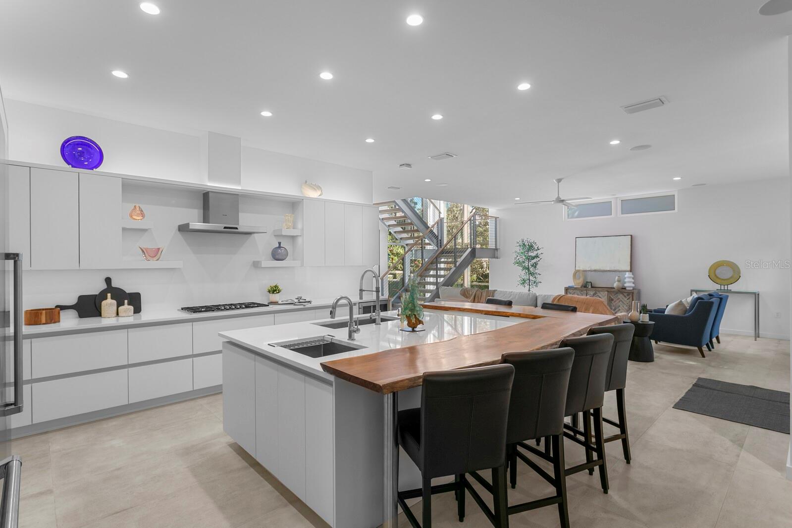 This open concept design features a stunning kitchen.