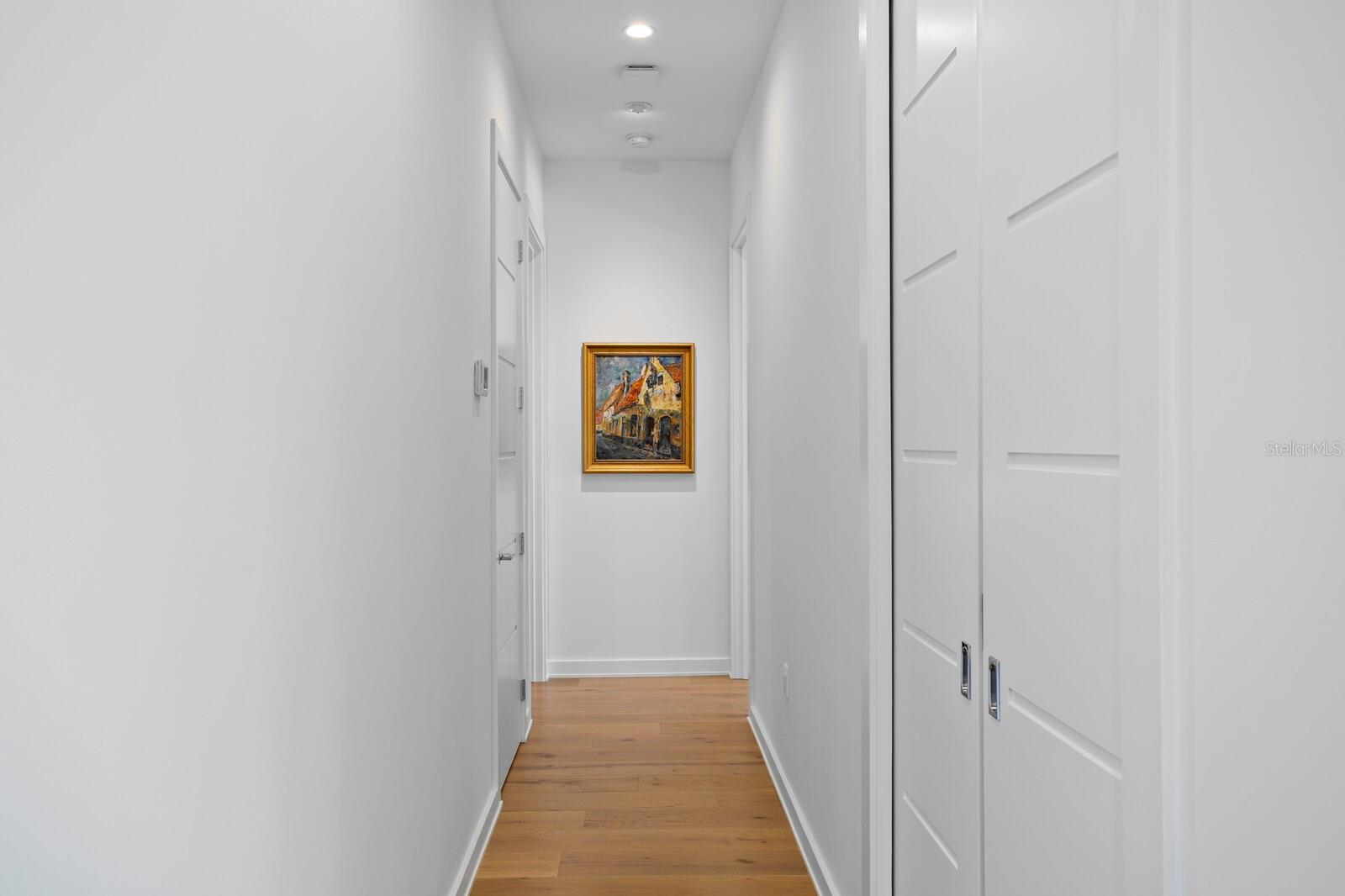 Down the hall you'll find two more bedroom suites.