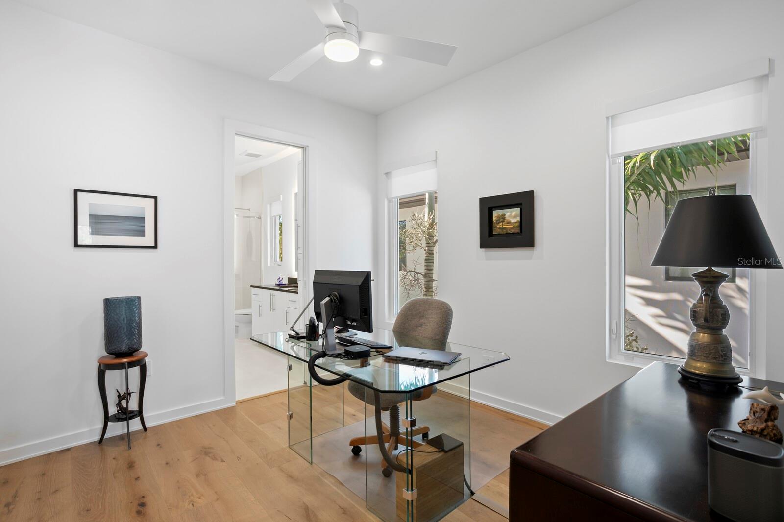 This bedroom is currently used as a second office.