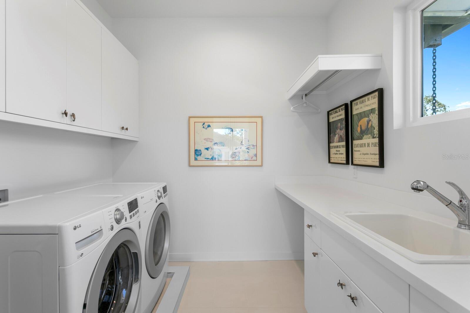 The laundry room is incredibly functional.