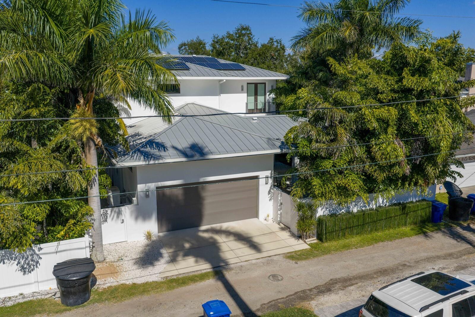 Alley access to the large two-car garage.