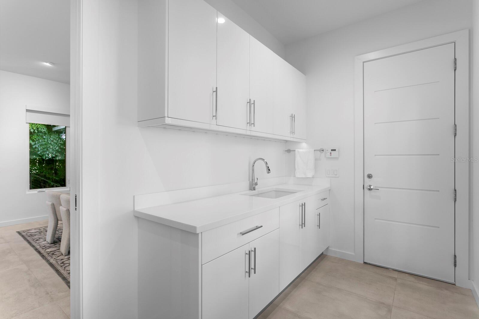 A mud room is adjacent to the garage for even more storage.