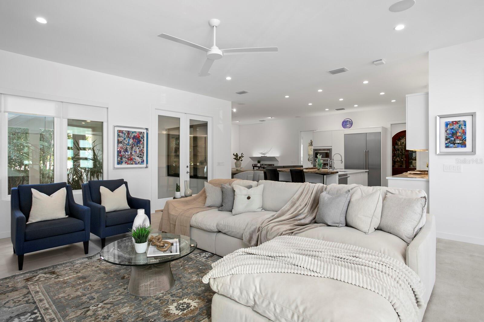 There's a spacious, bright living area.