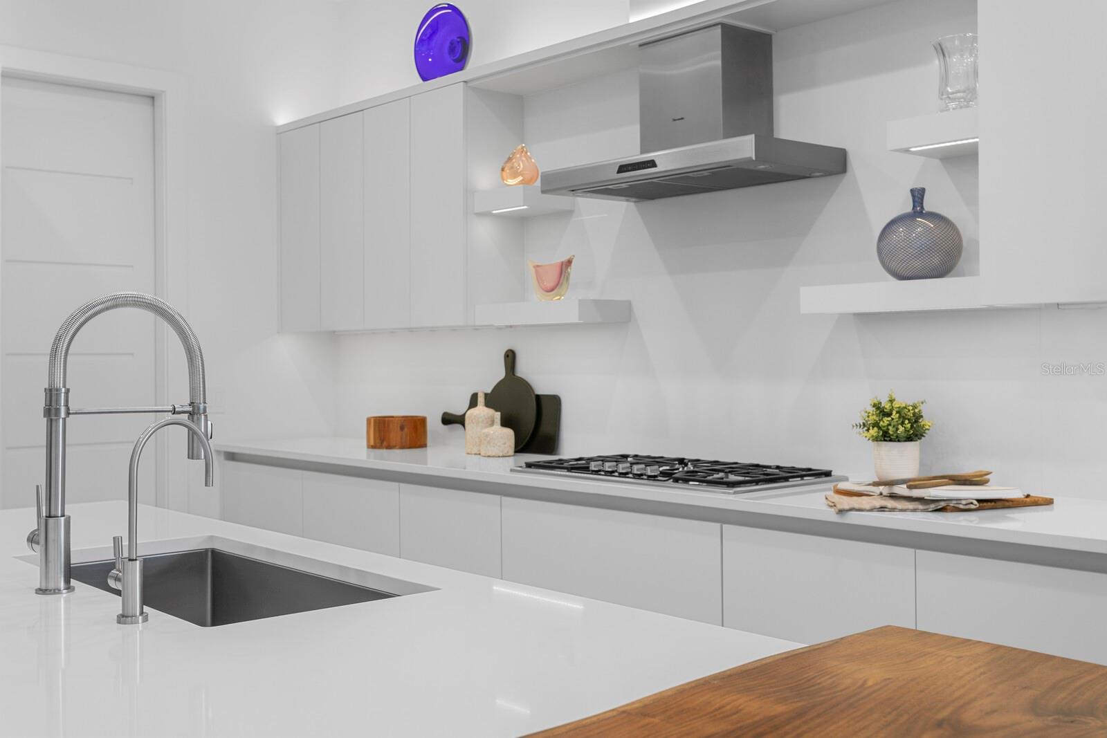 You'll appreciate the high end appliances and work space.