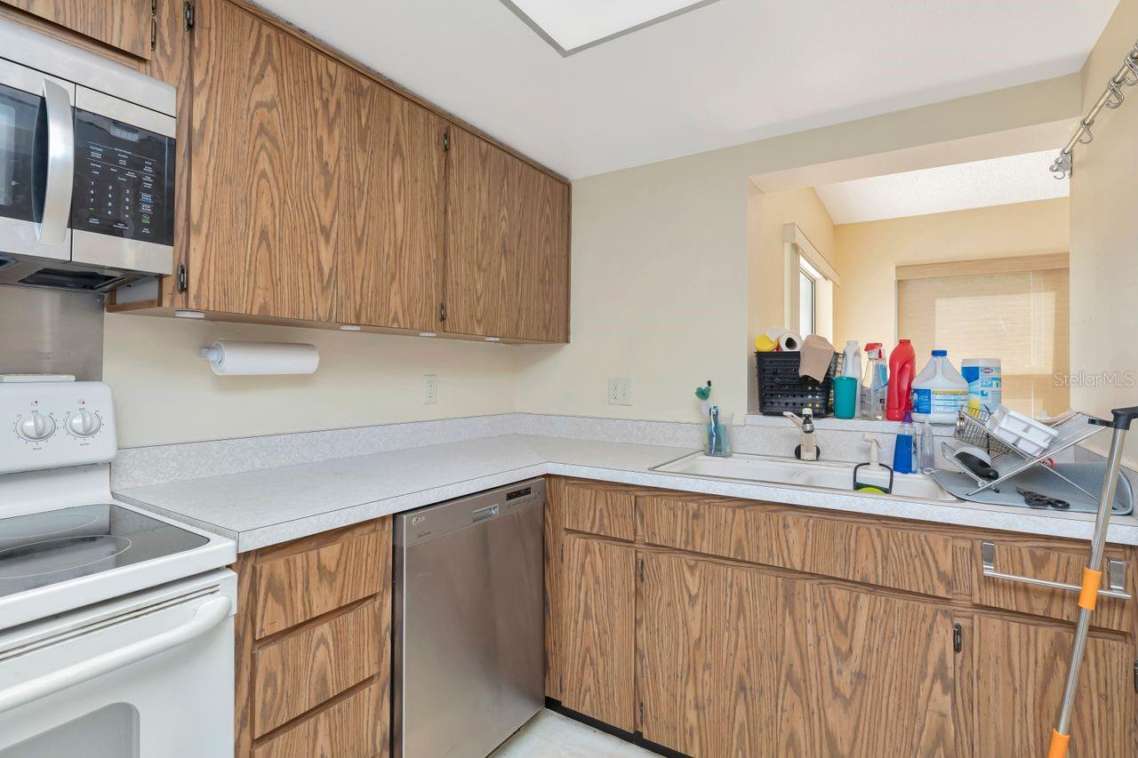 Bright and open kitchen with sink offering a view of the outdoors