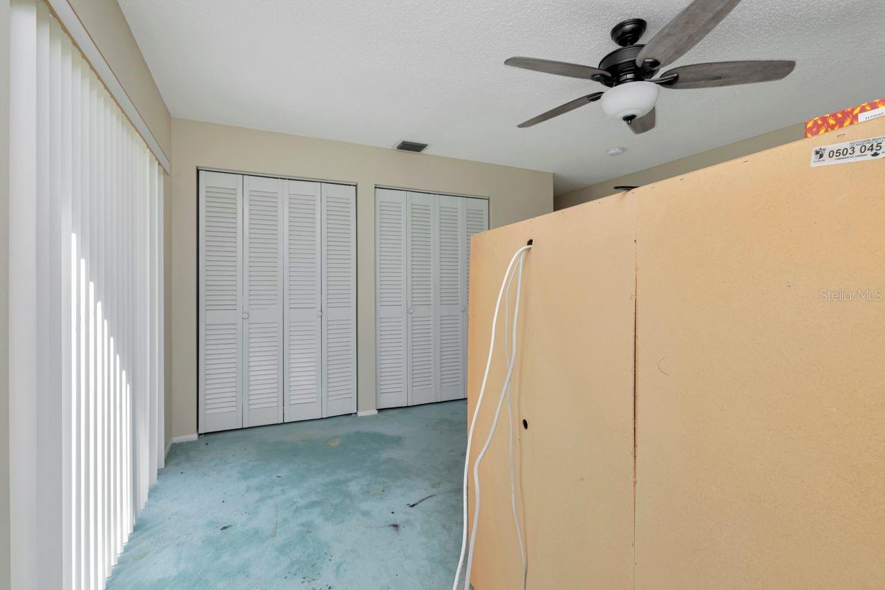 2 sets of closet doors open to one large closet
