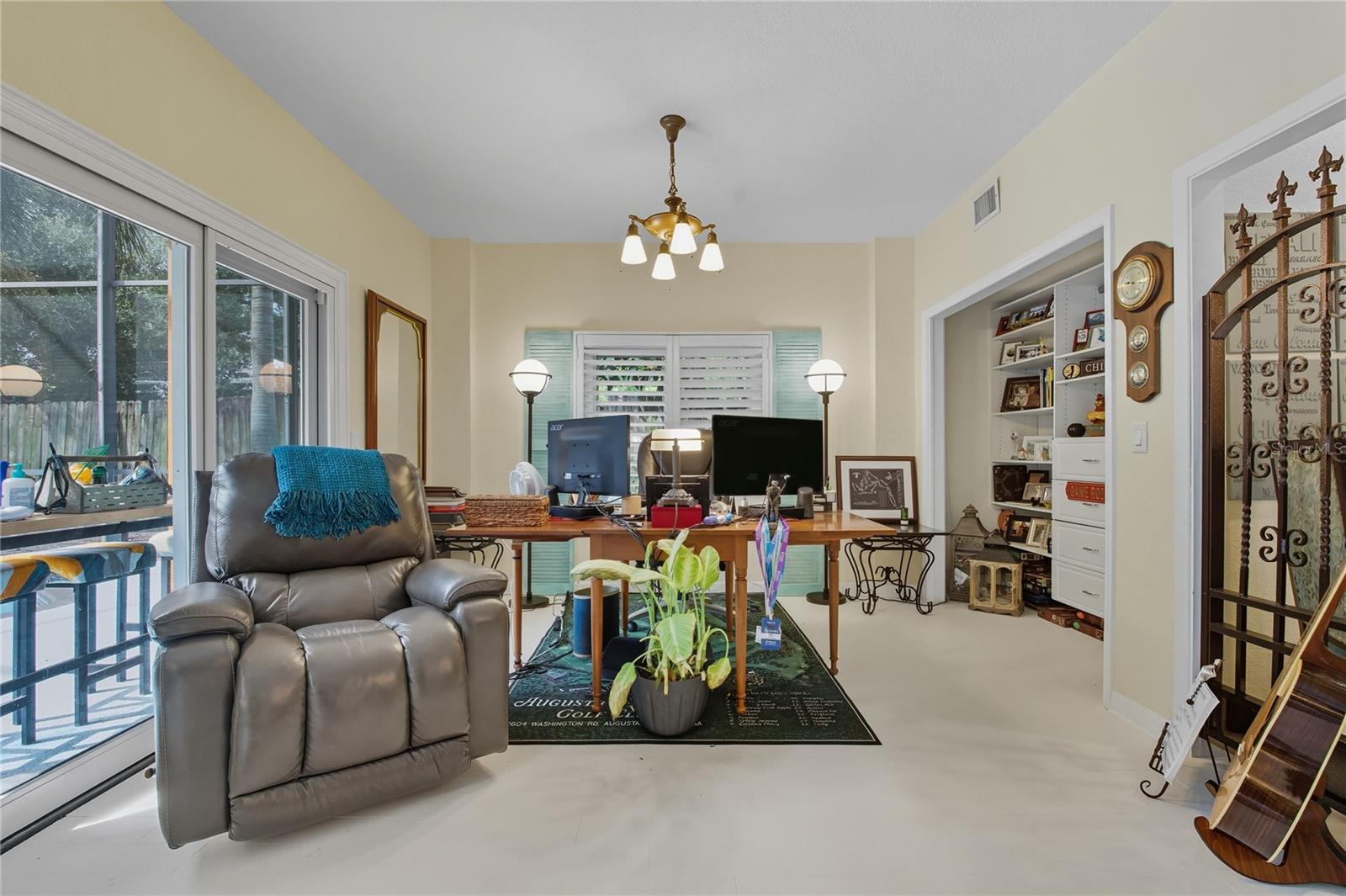 THIS AREA IS CURRENTLY SET UP AS AN OFFICE, BUT COULD EASILY BE CONVERTED TO A BEDROOM OR IN-LAW SUITE