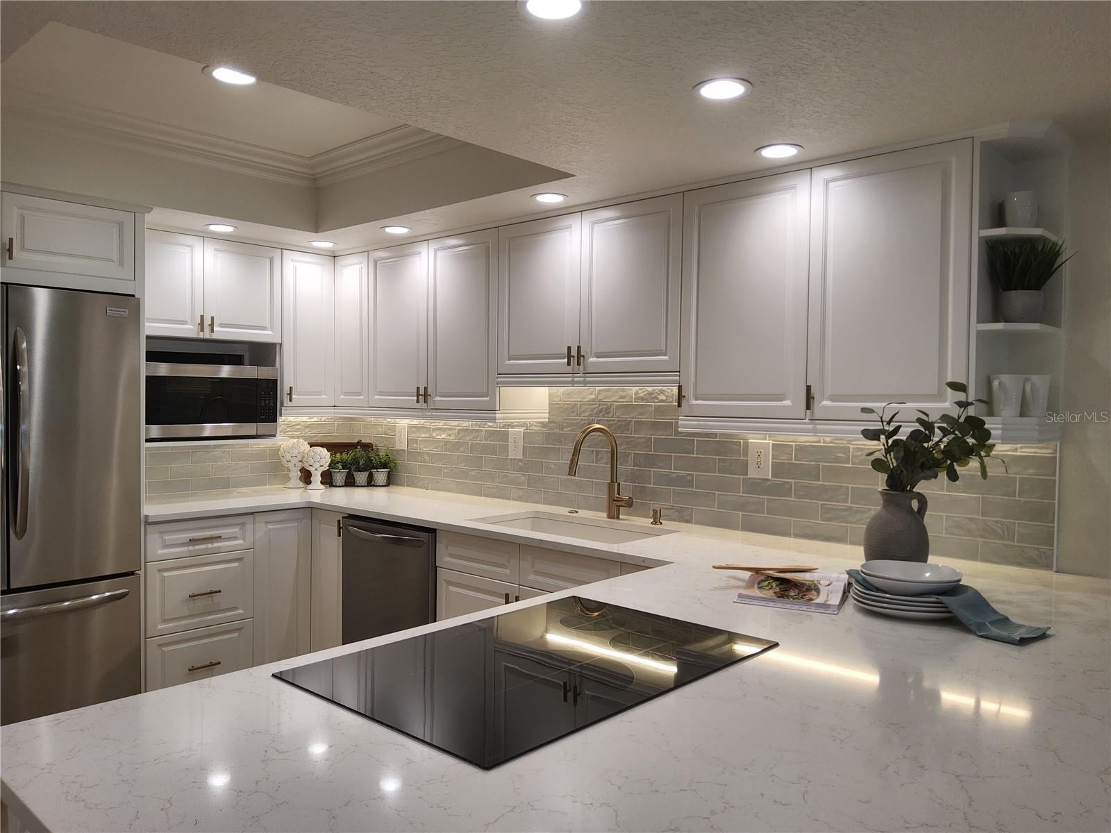 Quartz counter and subway tile backsplash