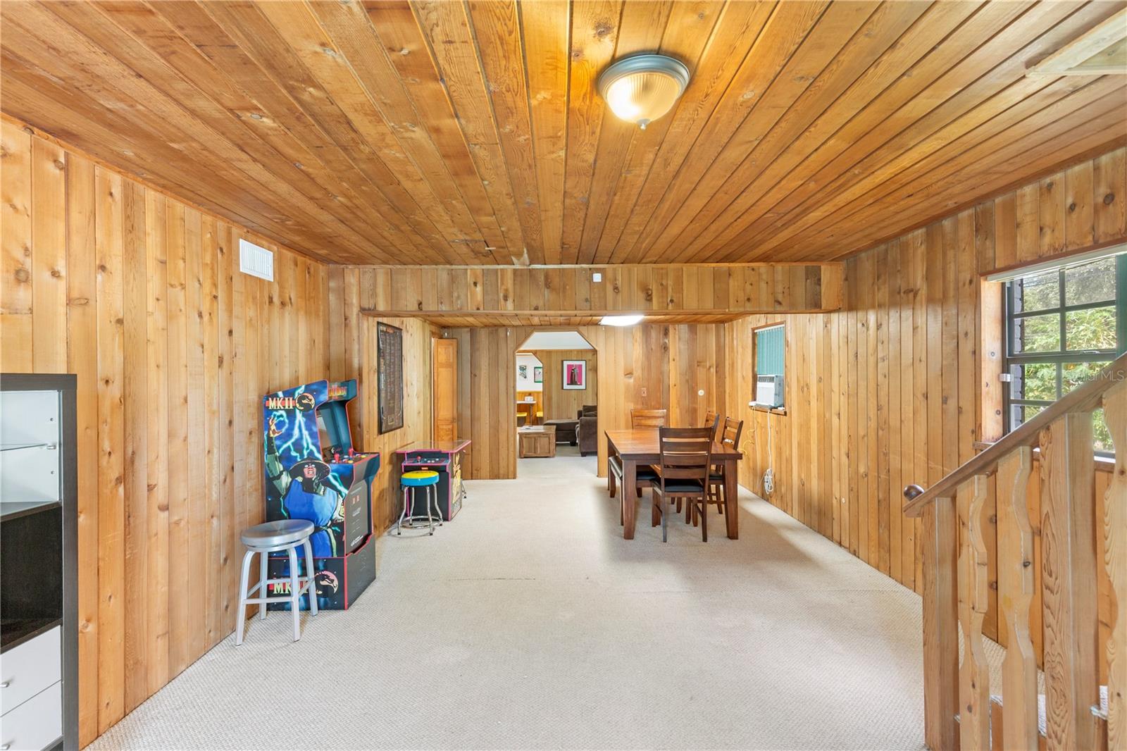 game room looking into dining room area